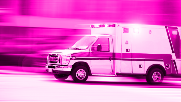 ambulance travelling at speed, on the way to an emergency